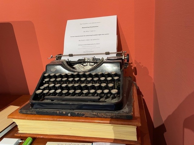 Antique typewriter displaying personal branding for executives